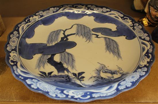 Japanese Arita blue & white foliate rim dish, late 17th/early 18th century, rivet repairs(-)